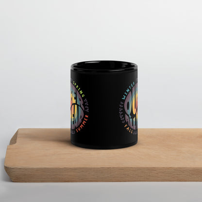 “Queer All Year” Black Glossy Mug