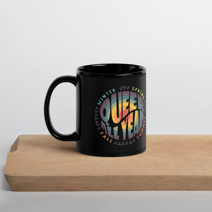 “Queer All Year” Black Glossy Mug