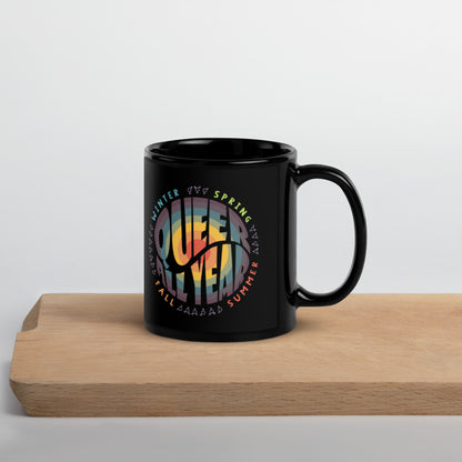 “Queer All Year” Black Glossy Mug