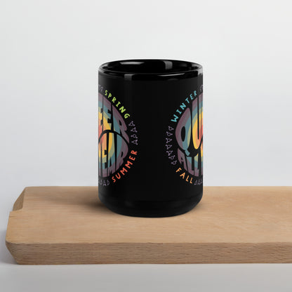 “Queer All Year” Black Glossy Mug