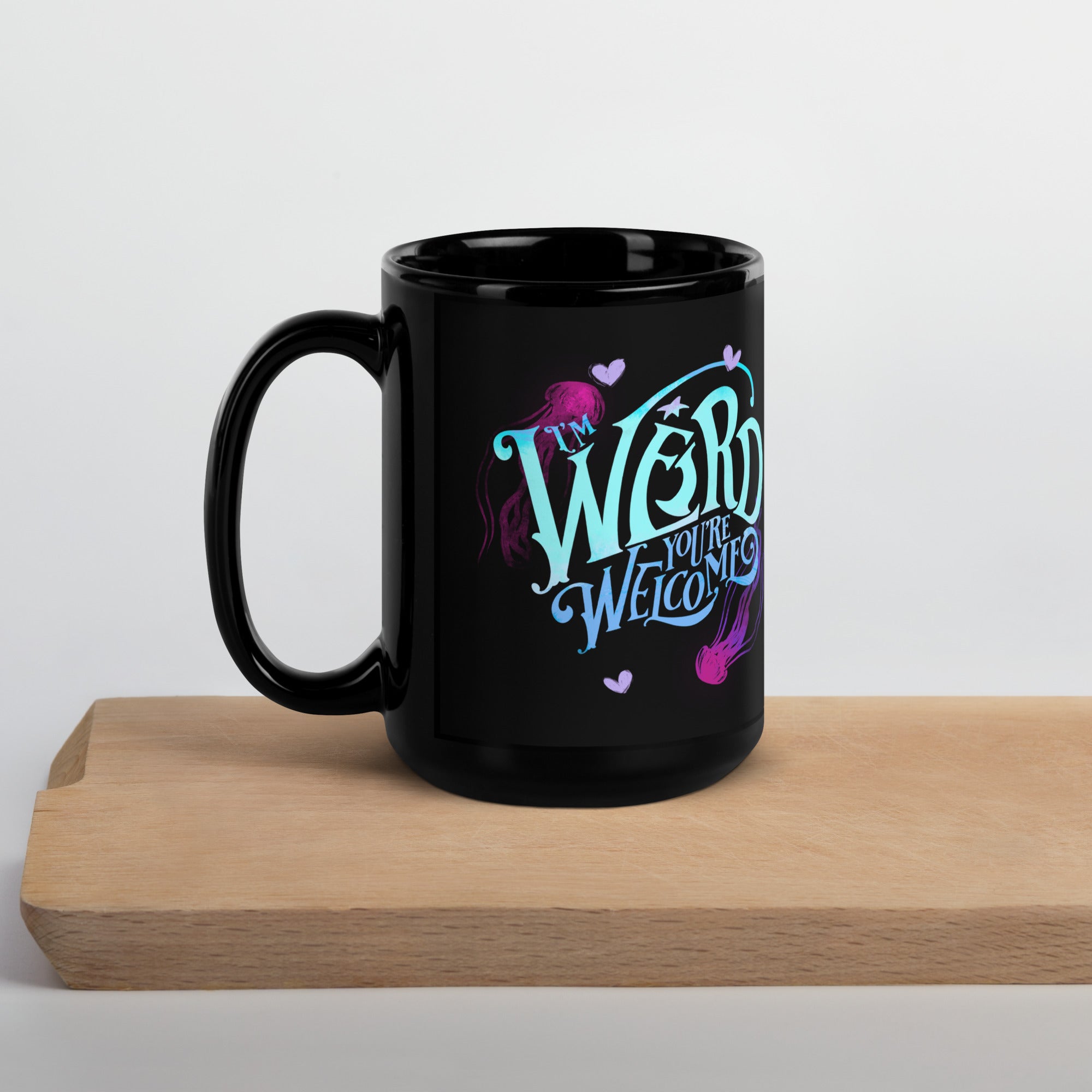 Blue "I'm Weird, You're Welcome" Black Glossy Mug