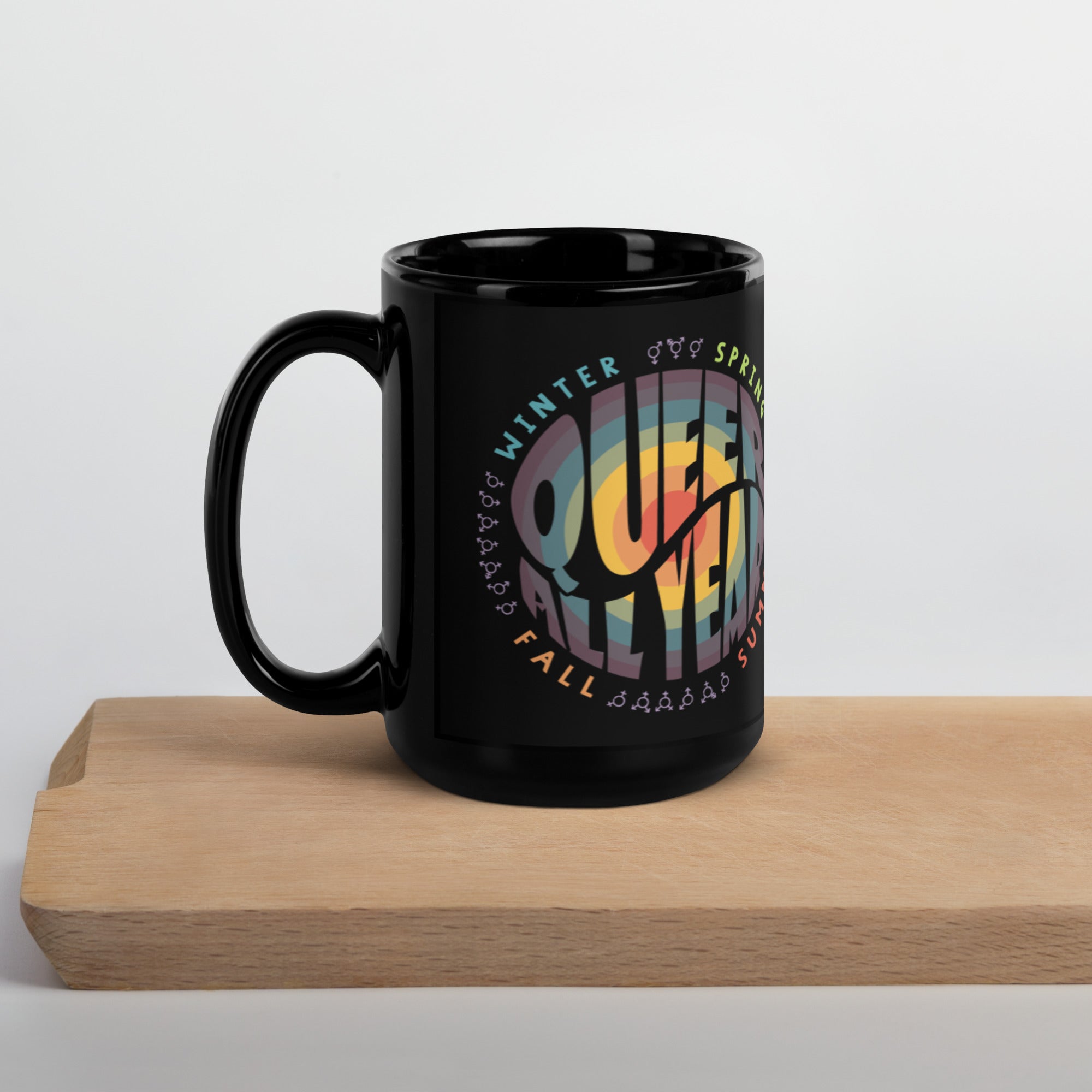 “Queer All Year” Black Glossy Mug