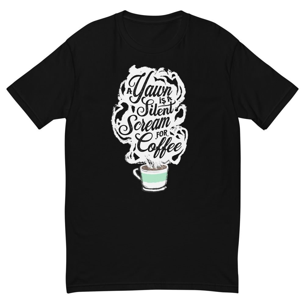 Black Masc fit Tee with White coffee cup with green stripe filled with hot coffee that is releasing white steam. "A Yawn is a Silent Scream for Coffee" written in the steam. 