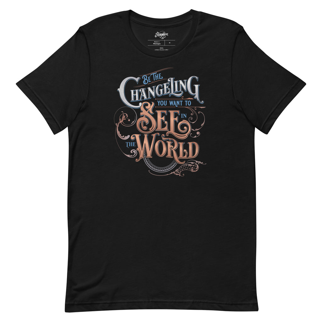 Black unisex fit tee with design  “Be the Changeling you want to see in the world” in silver, bronze and blue lettering surrounded by intricate decals
