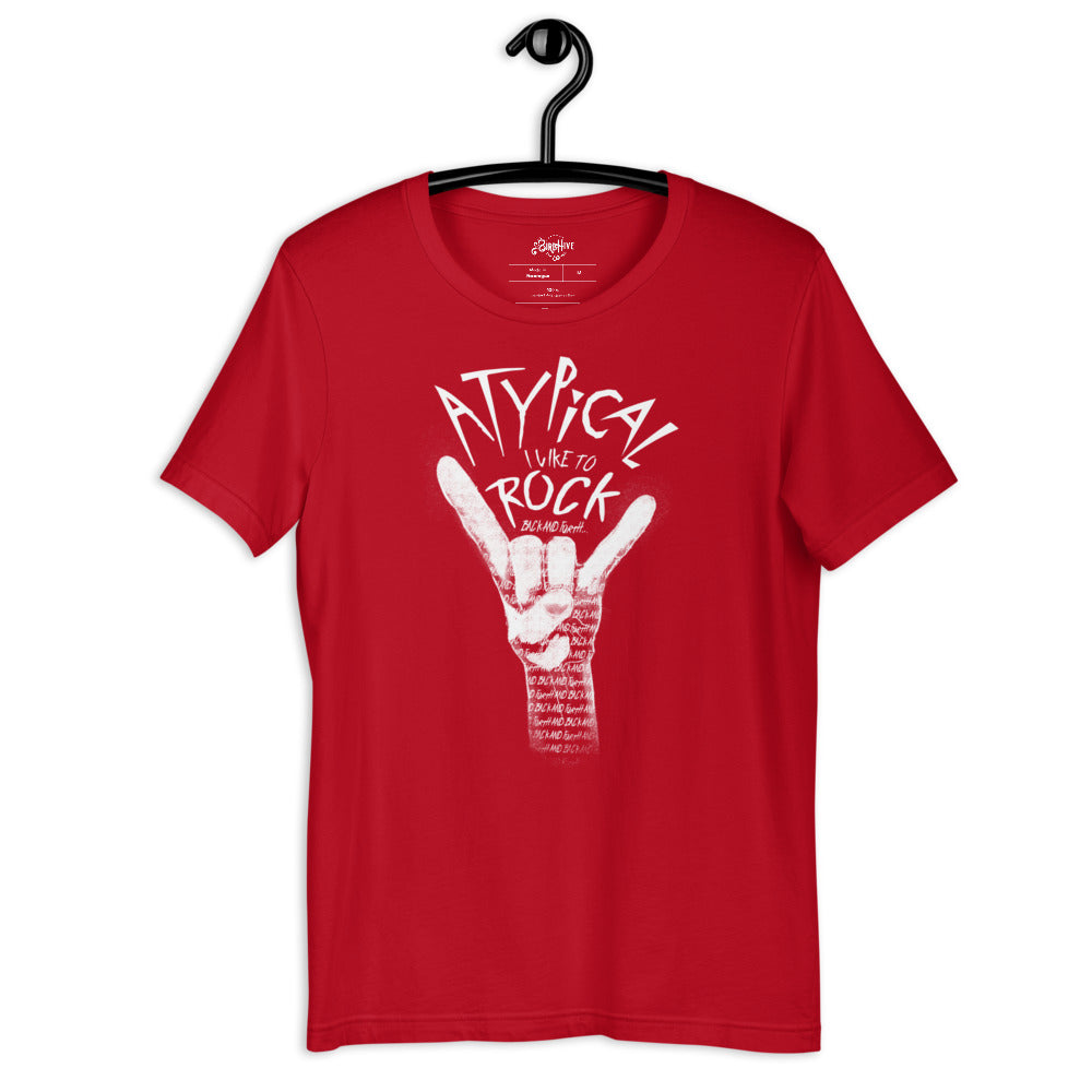 Red Unisex fit tee with design “Atypical, I like to ROCK” in smaller font “back and forth”. Painting of a white hand making the ROCK symbol. Inside the shading of the hand words continue saying “back and forth and back and forth and back and forth…” repeated.