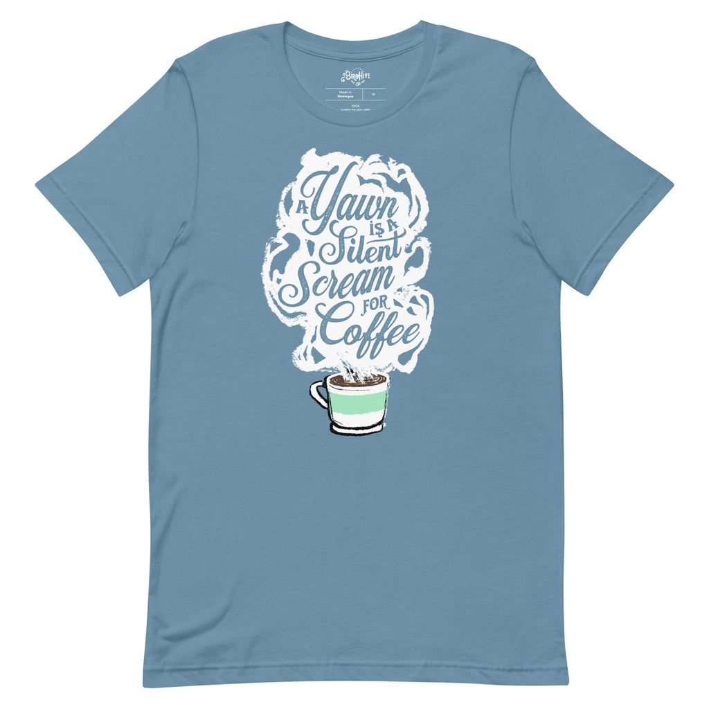 Steel Blue (light blue) Unisex fit Tee with White coffee cup with green stripe filled with hot coffee that is releasing white steam. "A Yawn is a Silent Scream for Coffee" written in the steam. 
