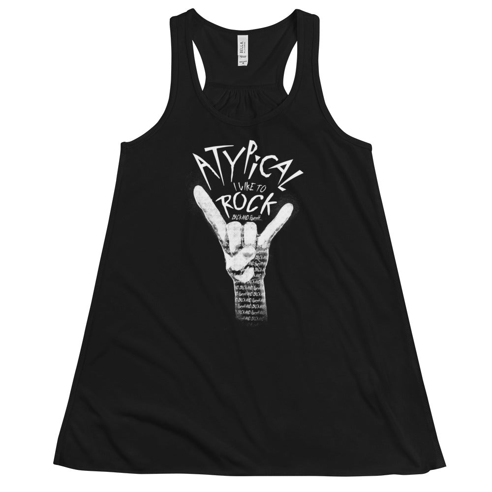 Black flowy fem fit racerback tank with design “Atypical, I like to ROCK” in smaller font “back and forth”. Painting of a white hand making the ROCK symbol. Inside the shading of the hand words continue saying “back and forth and back and forth and back and forth…” repeated.